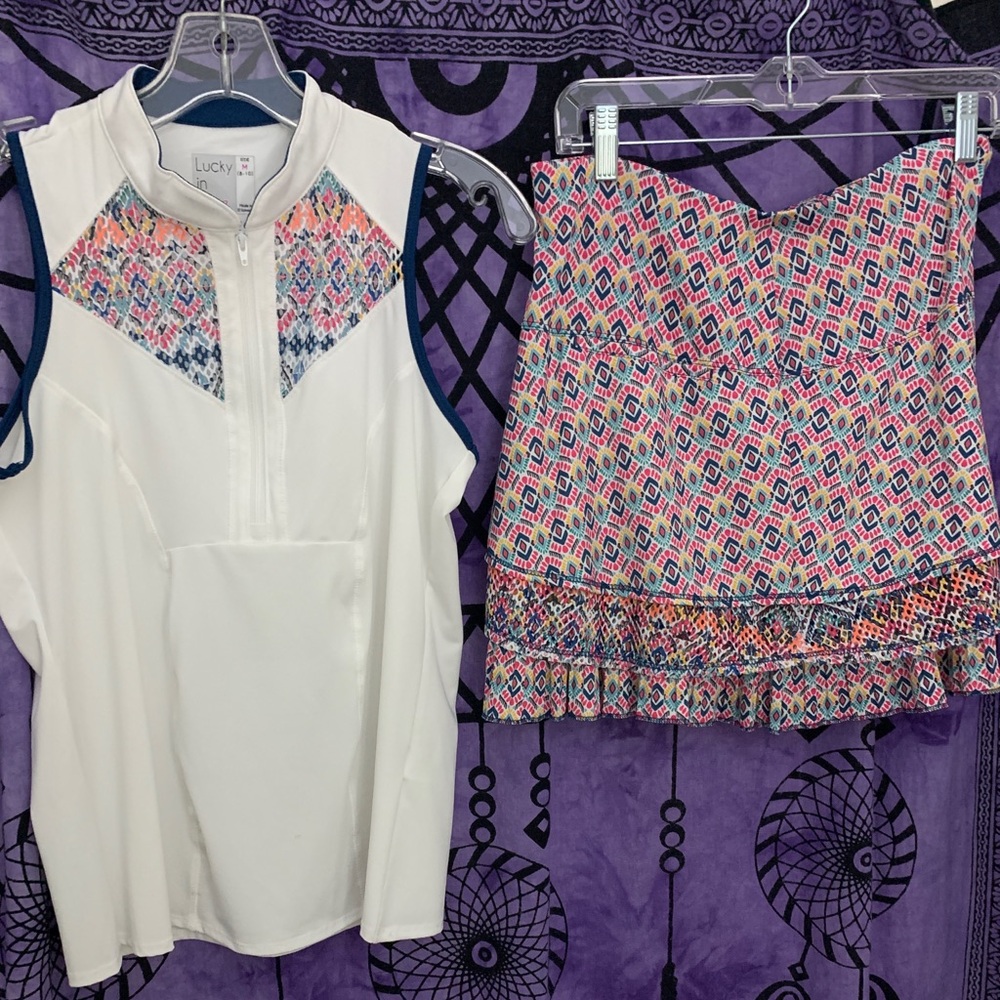 Lucky in Love patterned athletic set. Includes matching top and bottom.
